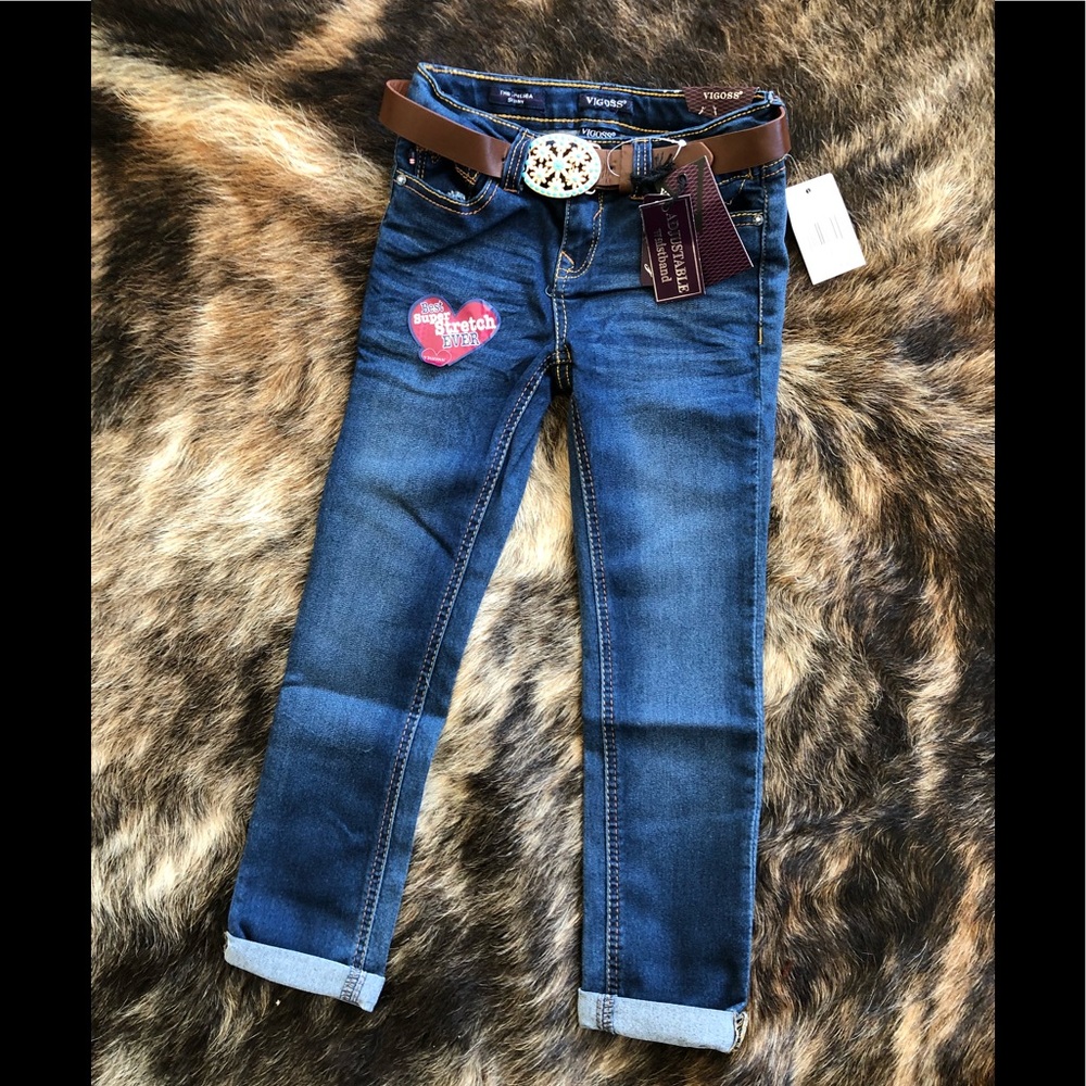Belted skinny jeans